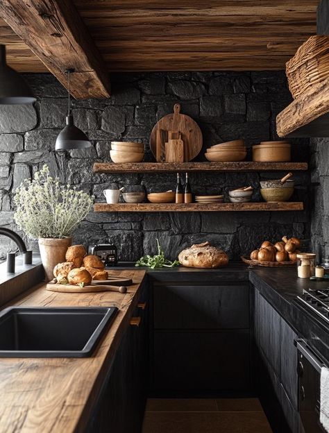 Dark Stone Backsplash, Stone Wall Interior Kitchen, Wood Burning Stove In Kitchen, Black Stone Backsplash, Dark Rustic Kitchen, Cozy Cabin Kitchen, Dark Kitchens, Tuscan Cooking, Earthy Kitchen