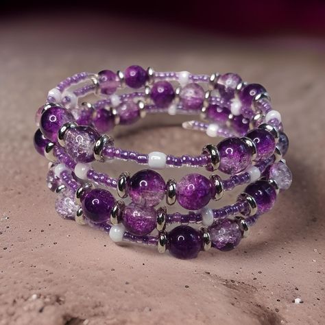 Looking for a unique piece to complete your ensemble? Look no further than our multi strand memory wire bracelet in shades of lavender and purple beads. Handmade with love and care, this bracelet showcases a beautiful combination of purple, lavender and purple lined beads that will elevate any outfit. Wrap it around your wrist for a touch of elegance and flair. Memory Wire Bracelets Ideas, Goth Shopping, Purple Bracelets, Shades Of Lavender, Memory Wire Wrap Bracelets, Bracelets Easy, Bracelet Inspo, Inspiration Painting, Purple Beads