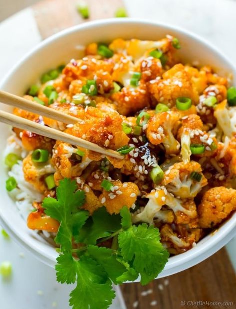 Firecracker cauliflower with marinated cauliflower florets, sauteed on high heat to keep it crunchy and then coated in sweet and spicy finger-licking firecracker sauce. sweet and sour and hot firecracker sauce..there is something exciting about these. Don't you think? #caulfilower #dinnerrecipes Cauliflower Rice Bowl Recipes, Firecracker Cauliflower, Asian Cauliflower Rice, Firecracker Recipe, Marinated Cauliflower, Asian Cauliflower, Rice Bowl Recipes, Cauliflower Rice Bowl, Rice Asian