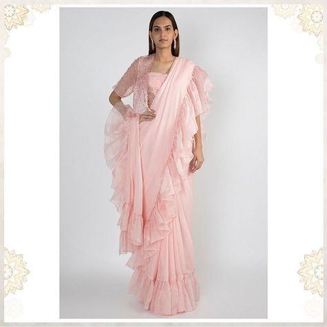 Loving this beautiful shade . Baby pink saree in organza and raw silk base with ruffles. It is paired with matching bustier and short jacket in crepe base having 3D rose gold hand embroidery! . . #MasumiMewawalla #PinkPeacockCouture #fashiondesigner #Indiandesigner #lakmefashionweek #fashionweek #runawayfashion #newcollection #autumwinter #bridetobe #weddingwear #wedzo #wedwise #wedmegood #weddingdress #Indianweddings #India Baby Pink Saree, New Saree Style, Desi Dress, New Saree, Fancy Saree, Saree Style, Indian Designer Sarees, Designer Sarees Collection, 3d Rose