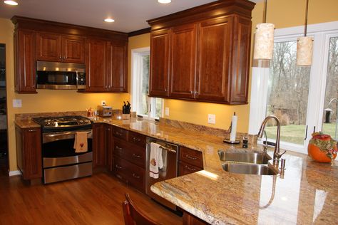 undefined Cherry Cabinets Kitchen Wall Color, Cherry Wood Kitchen Cabinets, Cherry Wood Kitchens, Cherry Wood Cabinets, Best Kitchen Colors, Trendy Kitchen Colors, Paint For Kitchen Walls, Painted Kitchen Cabinets Colors, Oak Kitchen Cabinets