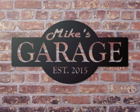 "Personalized Garage Sign Perfect Gift for Father's Day, Birthday, Christmas, new garage grand opening. If you are trying to find a gift for the man that has everything, Does he have one of these. Not only that but it is personal so he know you were thinking of him. Great Christmas Gift for Him Ordering is simple Just order the size and color you want and in the \"personalization\" field add the Name. Mounting holes come standard in the corners of the sign. If you don't want them, please put tha Custom Garage Signs, Christmas Garage, Man Garage, Porch Living, Mechanic Gifts, Man Cave Home Bar, Custom Garages, Personalized Metal Signs, Garage Signs