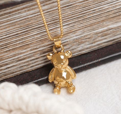 Add a touch of whimsy to your outfit with our adorable 'Dainty 'n Cute 18K Gold Plated Teddy Bear Charm Necklace'. #WhimsicalFashion #AdorableJewelry #TeddyBearCharm #DaintyNecklace #GoldPlated #CuteAccessories #FashionFinds #JewelryLovers #CharmNecklace #ShopNow Beaded Jewelry Necklaces, Y2k Jewelry, Normal Delivery, Clean Girl Aesthetic, Bear Necklace, Bear Pendant, Zodiac Pendant, 18k Gold Jewelry, Kids Jewelry