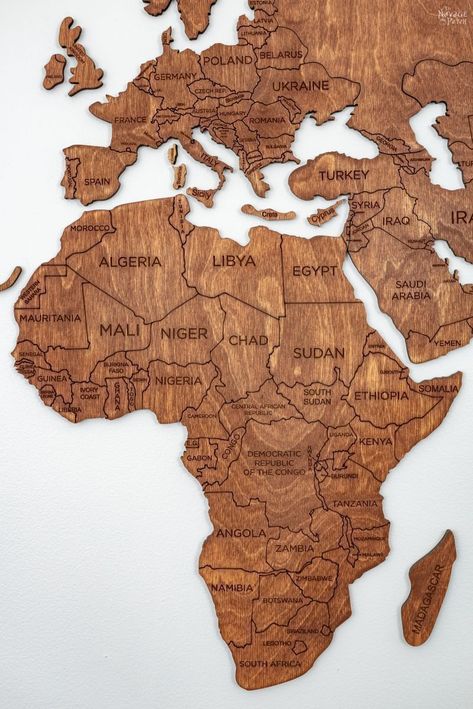 Wooden World Map Wall Art and 28 Free Printable Vintage Maps | Free printable poster size vintage world maps | Free vintage map digital papers | Free poster size vintage maps for upcycling | Free printable old world maps | #TheNavagePatch #freeprintable #DIY #DIYhomedecor #upcycle #diydecor #teenbedroom #vintage #maps #upcycledmaps | TheNavagePatch.com Africa Wall Art, The Navage Patch, Navage Patch, Maps Aesthetic, Eagle Decor, Free Poster Printables, World Map Wall Decor, Digital Paper Free, Door Design Images