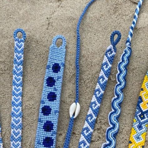 @mary_bracelets22 on Instagram: "Rest of my blue bracelets 💙  Patterns: #144432 #150 #147802 square knot bracelet with shell #90056 peruvian wave bracelet #147580  #friendshipbracelets #bracelets #handmade #friendshipbracelet #bigbracelet  #bracelet #dmcthreads #handcrafted #smallbusiness #braceletset #braceletbook #summerbracelets #dmc #embroideryfloss #trendybracelets #bransoletkizmuliny #bransoletkiprzyjaźni #bransoletki #threadbracelets #rękodzieło" Peruvian Wave Bracelet, Wave Bracelet Pattern, Camp Bracelets, Square Knot Bracelet, Knots Jewelry, Square Knot Bracelets, Blue Bracelets, Floss Bracelets, Big Bracelets