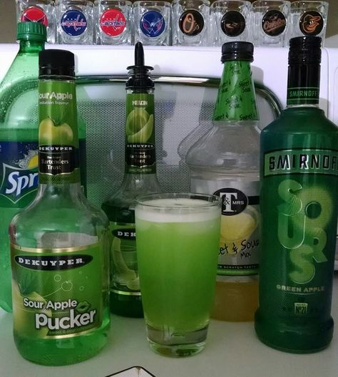 Green Apple Special  -2oz Sour Apple Vodka -2oz Melon Liqueur -2oz Sour Apple Pucker schnapps -2oz Sour mix Mix w/ ice & strain into a chilled glass. Top off with Sprite Apple Drinks Alcohol, Vodka Melon, Shots Alcohol Recipes, Sour Apple Pucker, Apple Schnapps, Apple Pucker, Fun Party Drinks, Apple Vodka, Melon Liqueur