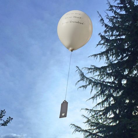 ECO-FRIENDLY FUNERAL BALLOON RELEASE KIT Contents: 10 x white 12 biodegradable remembrance balloons printed with the words You are Loved, You are Missed, You are Remembered in grey. 10 x compostable bio-safe balloon seals complete with 1.5 metres of string. 10 x white card tags with a heart cut-out for you to write a message before releasing the balloons. These look wonderful released en masse and create a quiet, peaceful moment to mark the end of a funeral or celebration of life, as they ... Balloon Release Ideas, Estate Planning Checklist, Balloon Release, Birthday In Heaven, In Memory Of Dad, Printed Balloons, White Balloons, Memorial Service, Heart Cards