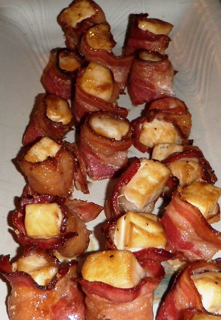 Marinated Bacon Wrapped Halibut Bites - 1/2 cup maple syrup  1/4 cup low-sodium soy sauce  1 tablespoon dijon freshly ground pepper to taste 4 (1” thick) halibut fillets,  __  cut into 1” cubes (24) 12 slices of smoked bacon,  __ halved (24 pieces)  4 (12”) metal skewers  1 teaspoon dark brown sugar Bacon Wrapped Walleye, Alaskan Meals, Alaska Recipes, Seafood Dinner Party, Walleye Recipes, Halibut Recipes, Metal Skewers, Tasty Meat, Seafood Dinner