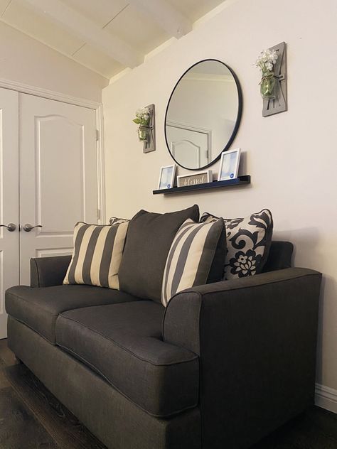 Circle Mirror Living Room Decor, Circle Mirror Over Couch, Couch With Mirror Above, Circle Mirror Above Couch, Round Mirror Over Couch, Round Mirror Above Couch, Circle Mirror Living Room, Mirror Above Couch Living Room, Living Room Mirror Above Couch