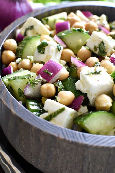 This Chickpea Cucumber Feta Salad has ALL the best flavors! Loaded with chickpeas, cucumbers, red onions, feta cheese, and fresh basil....this salad is so easy to make and is the perfect side dish for any meal! Pineapple Feta Salad, Chickpea Cucumber Feta Salad, Feta Orzo Salad, Chickpea Cucumber Salad, Chickpea Cucumber, Chickpea Feta Salad, Feta Orzo, Chickpea Feta, Salad Calories