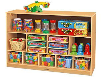 Everything has its place in our accessible hardwood unit that's just the right height for preschoolers! There's a long open shelf on top�2 roomy cubbies and 6 divided compartments in the middle for games, paper and more�plus 5 cubbies on bottom to use with or without our Clear-View Bins (sold separately below). Unit measures 46 1/4"w x 14"d x 30"h. Cubby Shelf, Tall Shelves, Storage Center, Diy Preschool, Lakeshore Learning, Shelves Storage, Flexible Seating, Classroom Furniture, Beautiful Storage