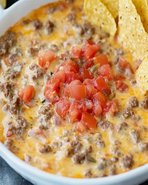 Make this quick Rotel Dip recipe with just 4 ingredients – Velveeta, ground beef, Rotel, and cheese. Perfect for parties or game days! Hamburger Velveeta Rotel Dip Crockpot, Ground Turkey Queso Dip, Hamburger Cheese Dip Velveeta, Beef Velveeta Cheese Dip, Velveeta Ground Beef Dip, Rotelle Dip Velveeta Ground Beef, Sausage Velveeta Rotel Dip, Hamburger Rotel Cheese Dip, Ground Beef Dip Crockpot