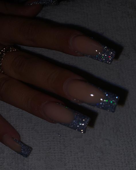 Long Silver French Tip Nails, Short Square Acrylic Nails White Glitter, Silver Glitter French Tip Nails Short, Hoco Nails Acrylic Silver, White Glitter V Tip Nails, Black Snd Silver Acrylic Nails, Reflective Silver Nails, Silver Glitter French Tip Nails Square, Reflective Glitter Nails French