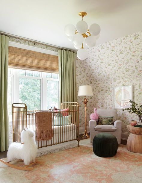 In Sage’s bedroom, soft surfaces and pale colors are complemented by pretty wallpaper and a sleek brass ceiling fixture. | Photographer: Alex Lukey | Designer: Hali MacDonald, Architecture by Gren Weis Architect & Associates Nursery Trends, Bubble Design, Nursery Room Design, Girl Nursery Room, Baby Room Inspiration, Nursery Room Inspiration, Baby Room Design, Entryway Kitchen, Nursery Baby Room