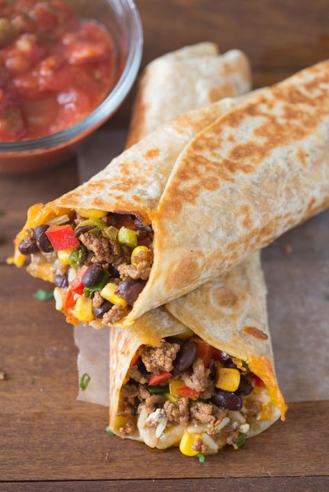 A close up of two Crispy Wraps filled with ground beef, black beans and vegetables Southwest Chicken Burritos, Southwest Wraps, Southwest Tacos, Southwest Wrap, Lime Coleslaw, Navajo Tacos, Sandwich Vegetarian, Recipe Diaries, Southwest Recipes