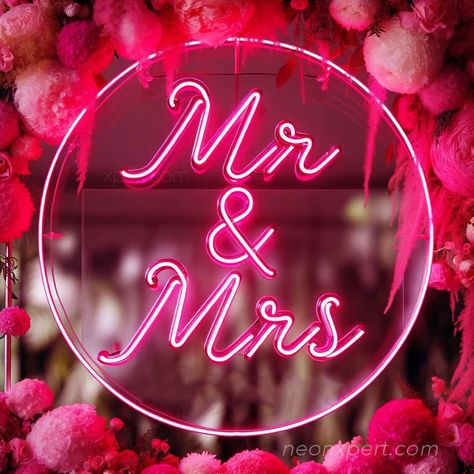 The Mr & Mrs Neon Sign is a beautifully crafted piece that adds a romantic and elegant glow to your wedding celebration. This LED neon sign, featuring the classic "Mr & Mrs" text, is perfect for creating a warm and inviting atmosphere at your wedding reception, photo backdrop, or as a charming addition to your marital home. Ideal for newlyweds or couples celebrating their union, this sign brings a personalized touch to your special day. Discover more top neon signs ideas. Wedding Reception Photo Backdrop, Reception Photo Backdrop, Celtic Magic, Twin Flame Art, Neon Sign Shop, Flame Art, Romantic Lighting, Neon Glow, Elegant Font