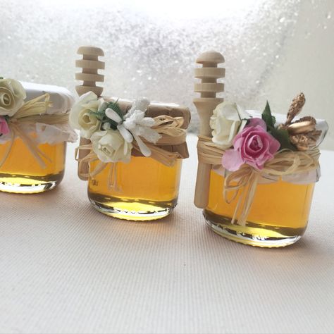 Personalized gifts, which are indispensable for your wedding parties, are a welcome form that makes all guests happy. These mini honey jars, which you will present to your guests to show your gratitude, will more than fulfill their task. The quality honey contained in it will remain in the memory of your guests for a long time. It is a gift that you can easily present for all your parties. Wooden Suitcase, Honey Jars, Honey Spoons, Jam Jars, Polka Dot Paper, Gifts For Guests, Wedding Gifts For Guests, Honey Jar, Jam Jar