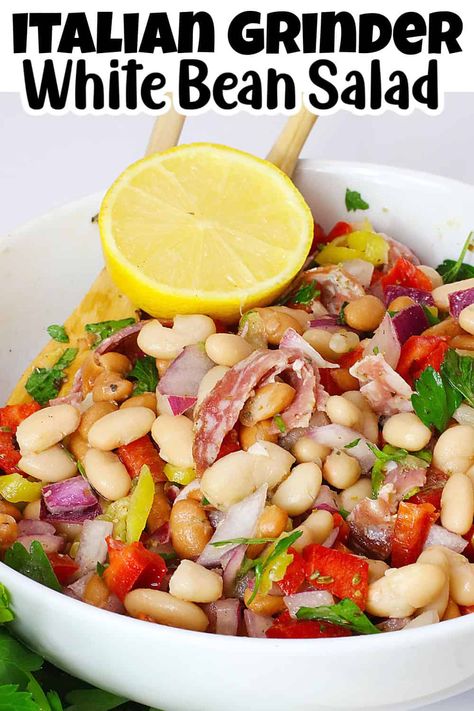 Try our mouthwatering white bean salad with salami and pepperoncini peppers - the ultimate side dish for every gathering. This no-bake recipe celebrates the iconic grinder sandwich flavors, using fresh Italian ingredients. Plus, it's gluten and dairy-free, making it a versatile option for any event. Pizza Bean Salad, Italian White Bean Salad, Italian Grinder Bean Salad, Grinder Bean Salad, Bean Salad Italian, White Bean Salad Recipes, Italian Grinder, Grinder Sandwich, Bean Salad Recipe