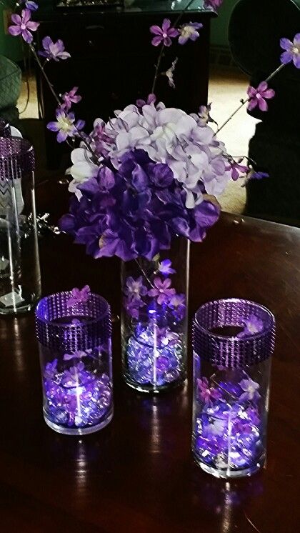 Purple Quinceanera Ideas Centerpieces, Quinceanera Dresses Purple And Gold, Purple Themed Centerpieces, Light Purple Quince Centerpiece, Purple Masquerade Quinceanera Ideas, Quencinera Purple Theme, Purple Butterfly Quinceanera Theme Centerpieces, Purple Enchanted Forest Quinceanera, Royal Purple Quinceanera Theme