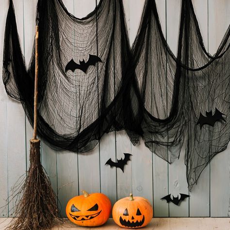 Unleash the ultimate horror this Halloween with our ghastly Halloween Creepy Cloth. Perfect for Halloween parties, haunted houses, masquerades, or while decorating for unsuspecting trick-or-treaters, this ghoulish Halloween decoration can be used both indoors and outdoors. The gauze cloth can be easily cut or ripped to the size and shape you desire. Use it to drape over furniture, such as tables and chairs, or hang across doorways, windows, ceilings, fireplaces, patios, and porches. Add accessor Halloween Ceiling, Halloween Photo Booth, Halloween Photography, Scary Decorations, Halloween Creepy, Halloween Photo, Lace Tape, Towel Crafts, Tables And Chairs