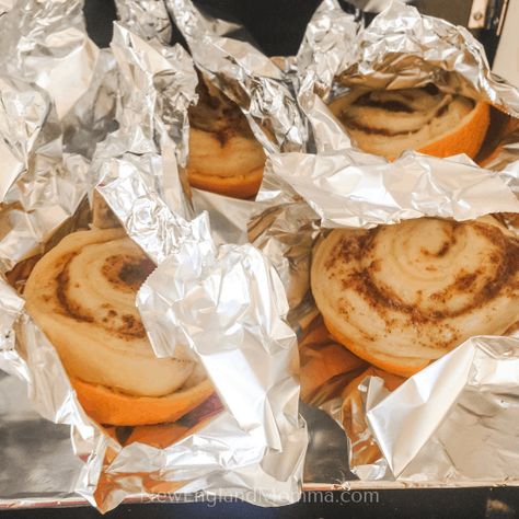 Camping Cinnamon Rolls, Campfire Cinnamon Rolls, Orange Cinnamon Rolls, Cinnamon Scrolls, Camping Projects, Orange Dessert, Orange Baking, Camping Desserts, Breakfast Rolls