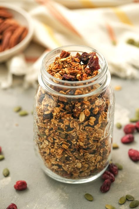 For a taste of fall, enjoy this healthy, homemade Pumpkin Granola recipe made with oats, quinoa, flax seed, maple syrup, pumpkin puree, pumpkin spice, cinnamon, pecans, pepitas, and dried cranberries. #granola #pumpkin #breakfast #oats #pumpkinspice #fallrecipes #healthyrecipes Skinnytaste Breakfast, Pumpkin Granola Recipe, Elimination Diet Plan, Puree Pumpkin, Healthy Pumpkin Recipes, Pumpkin Spice Granola, Pumpkin Granola, Oats Overnight, Pumpkin Oats