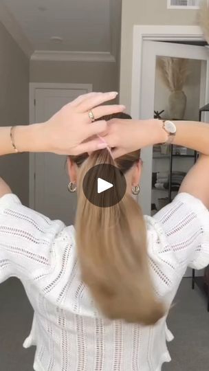 4.8K views · 115 reactions | Easy low bun for beginners 💁‍♀️ Gather your hair into a ponytail and secure with a hair tie. On the final pull through, stop half way to create a loop or “bun.” Split the hair below the bun into two equal sections. Bring the sections up and above the bun. Then, cross them. Bring the ends together under the bun. Secure them with a clear elastic. On the final pull through, stop half way to create a mini loop. Stuff the mini loop and any remaining hair into the hair tie. A stretchy hair tie is key!! 🔑 #hair #hairtutorial #updo #hairstyles #hairgoals #hair #haircare #hairstylist #hairstyle #hairstyling #reelfbpro #reelsfbシ #viralreelsシ #viralvideoシ #viralreelsfb #reelsviralシ #reelsvideoシ #reelfb #reelsvideo #reelsfypシ #reel #reelfyp #viralfb #virals | Cam1 | Jami Easy Low Bun, The Bun, A Ponytail, Low Bun, Updo Hairstyles, Pull Through, Hair Hairstyles, Hair Tie, Hair Goals