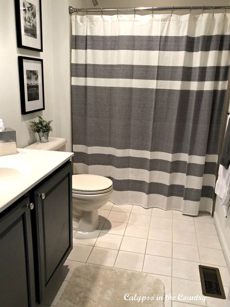 Gray and white boys bathroom Gray And Tan Bathroom, Guys Bathroom Ideas, Guy Bathroom, Tan Bathroom, Boys Bathroom Decor, Man Bathroom, Navy Bathroom, Painting Bathroom Cabinets, Gray And White Bathroom