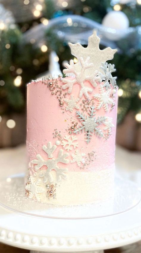 3. Ombre Pink Snowflake Cake How many weeks till Christmas? Have you decked your hall yet? We put our yesterday. Since our decorations done,... Pink Snowflake Cake, Wonderland Cake Ideas, Winter Wonderland Cake Ideas, Winter Onderland Birthday, Winter Onederland Party Girl 1st Birthdays, Winter Onederland Party Girl, Winter Onederland Cake, Christmas Birthday Cake, Winter Wonderland Cake