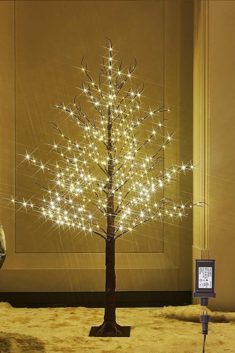 Illuminate your space with the LITBLOOM Lighted Brown Tree! 🌳✨ This 4FT twig tree with 430 LED fairy lights creates a magical atmosphere. Plug it in and let the warm glow add a touch of enchantment to your surroundings. Perfect for home decor, the soft lights bring a cozy ambiance. Elevate your space with the charm of this uniquely beautiful lighted brown tree! 🌟🌿 #LightedBrownTree #FairyLights #EnchantingDecor Victorian Ball, Tree With Lights, Brown Tree, Prelit Tree, Twig Tree, Led Tree, Ball Party, Led Fairy Lights, Cedar Trees