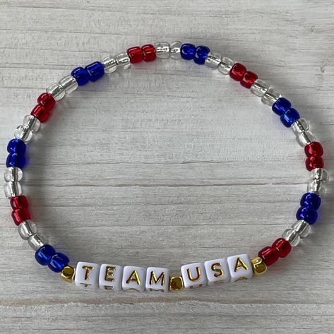 ⭐️Featured Bracelet of the Day 7/16⭐️ Get ready to cheer on our athletes with style! 🥇🇺🇸 Our TEAM USA bracelet is the perfect accessory to show your patriotic spirit as we count down the 10 days to the official start of the 2024 Olympic Games. Handmade with red, white, and blue beads, this bracelet is a must-have for every Team USA athlete, family, and fan. Grab yours now and wear it with pride! 🇺🇸✨ #EtsyShop #MamasCraftyCornerLC #HandmadeWithLove #CustomCrafts #TeamUSA #Olympics2024 #Patr... Olympic Bracelets, Usa Bracelet, Day 7, Team Usa, Olympic Games, Blue Beads, Red White And Blue, 10 Days, Red White