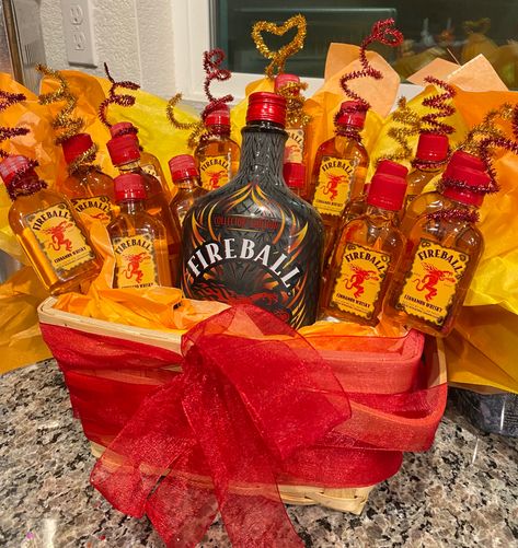 Fireball gift basket Liquor Gift Basket Ideas, Red Color Party Basket, Fireball Gifts Ideas Diy, Color Basket Party Ideas For Adults, Liquor Basket Ideas, Fireball Basket Gift Ideas, Fireball Gift Basket, Red Color Party Basket Ideas, Fireball Themed Party