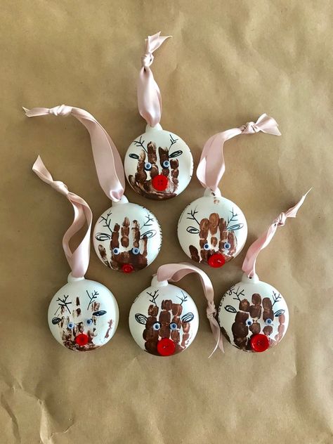 Footprint/Handprint Ornaments – Marquin Designs Handprint Ornaments Ball, Handprint Ball Ornaments, Reindeer Ornaments Handprint, Child Ornament Craft, Painted Ornaments Kids, Handprint Ornaments For Kids, Handprint Christmas Ornaments, Hand Print Ornament, Handprint Reindeer