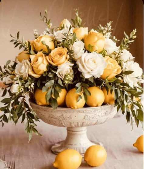 Lemon Flower Arrangements, Lemon Centerpiece Ideas, Lemons And Flowers, Minimalist Centerpiece, Lemon Centerpieces, Ivory Pillar Candles, Elegant Wedding Themes, Elegant Wedding Centerpiece, Summer Centerpieces