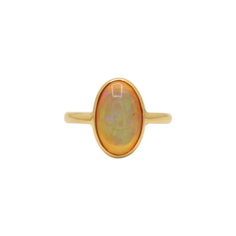 Natural High Quality Ethiopian Opal Gemstone 18k Solid Yellow Gold Handmade Rings Jewelry Item Type: Ring ----------------------- Stone: Ethiopian Opal --------------------------- Stone Color: Multi-Color ----------------------------- Stone Size: 14x9 ------------------------ Stone Cut: Faceted --------------------------- Shape: Oval --------------------------- Transparency: Translucent -------------------------------------- Natural/Lab-Created: Natural ----------------------------------------- Wedding Ring Luxury, Opal Jewelry Ring, Oval Opal Ring, Gem Stone Ring, Opal Wedding Ring, Minimalist Silver Ring, Handmade Gold Ring, Yellow Ring, Ring Luxury