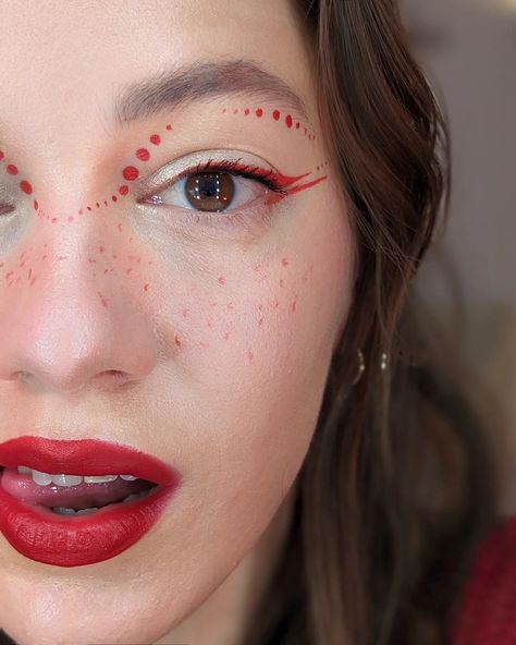 Still loving this look from last month omg ✨ @glisten_cosmetics water activated liner in lobster for both eyeliner and faux freckles @3ina no rules blush stick (gifted) @nyxcosmetics line loud lip pencil @fentybeauty stunna lip paint . . . #beautyreels #cherryred #redmakeup #makeupideas #graphicliner #makeup #beauty red makeup ideas, cherry makeup aesthetic, beauty tutorials, makeup hacks, graphic eyeliner, red eyeshadow, red lipstick @nyxcosmetics_uk @glistengirls_ Red Graphic Makeup, Red Makeup Ideas, Water Activated Liner, Glisten Cosmetics, Tutorials Makeup, Faux Freckles, Blush Stick, Graphic Makeup, Graphic Eyeliner