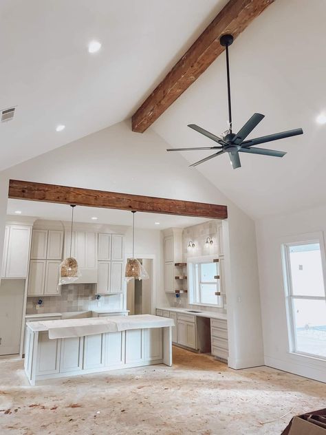 Wood Beams On Low Ceiling Living Room, Vaulted Ceiling With Ceiling Fan, Slant Ceiling Kitchen, Partial Vaulted Ceiling Kitchen, Wood Beam Vaulted Ceiling Living Room, White Shiplap Ceiling With Wood Beams, High Vaulted Ceiling Kitchen, Low Ceiling Beams, Wood Beam On Ceiling