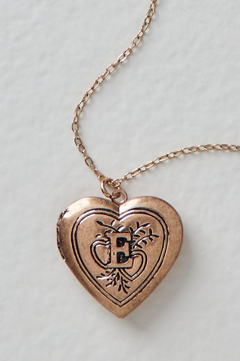 A super sweet gift or an accessory unique to you, this darling monogram necklace features a heart locket pendant with an initial engraving. **Features:** Dainty chain, heart locket pendant, hinge opening mechanism, monogram initial engraving, clasp closure **Why We | Monogram Necklace by Free People in Gold Unique Locket Necklace, Unique Locket, Free People Necklace, Engraved Locket, Gold Heart Locket, Gold Locket Necklace, Chain Heart, Sweet Necklace, Sister Necklace