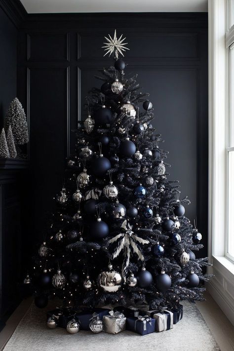 #christmastreeideas #tackydecor #holidaydecorating #christmastraditions #creativechristmas #festivedecor #christmasinspiration #holidaycheer Blue And Black Christmas Tree, Black And Blue Christmas Tree, Black Tree Decorating Ideas, Black Tree Christmas, All Black Christmas Tree, Black Christmas Tree Decorations Ideas, Black Xmas Tree Decorating Ideas, Christmas Tree With Blue Ornaments, Black And White Christmas Tree Ideas