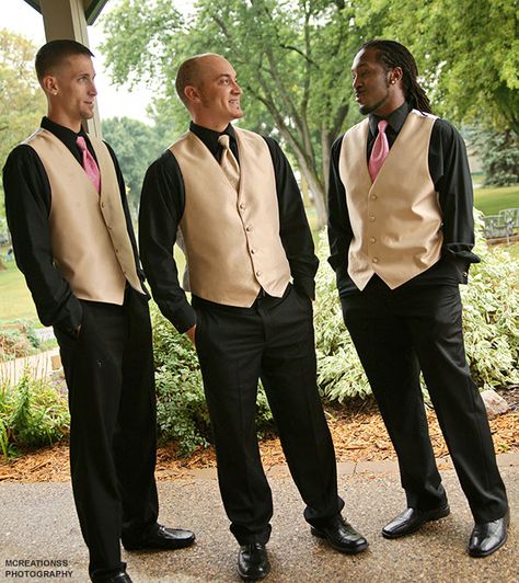 Change things up by combining a gold vest with black shirts and pants Black And Gold Groomsmen Suits, Groomsmen Gold Vest, Gold Vest Outfit Men, Gold And White Groomsmen Attire, Black And Gold Chambelanes Outfits, Black Suit Gold Accent, Black And Gold Tuxedo, Black Gold Wedding Theme, Black And Gold Suit