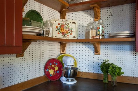 Corner of the rustic kitchen turned into storage space using pegboard on the walls Pegboard Backsplash, Kitchen Pegboard Ideas, Kitchen Pegboard, Pegboard Kitchen, Pegboard Ideas, Small House Decorating, Peg Board, Rustic Kitchen, Kitchen Storage