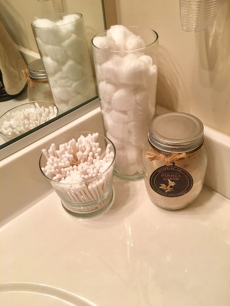 Bathroom organization- use dollar tree vase to hold cotton balls and q-tips. Bathroom Counter Organization Ideas, Apothecary Jars Bathroom, Easy Bathroom Organization, Dollar Tree Vases, Q Tip Holder, Best Closet Organization, Bathroom Drawer Organization, Stacking Shelves, Bathroom Counter Organization