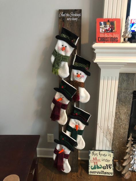 Beautiful Way To Display Stockings  -Paint and Stain can be customized -6 foot x 10 inch vertical stocking hanger -Solid wood with secured hooks -Main picture is dark brown stain and all lettering is painted (no vinyl) -This can be customized with a last name at the top of the board or small Christmas phrase, or you can select the santa hat    Please  note: stockings are not included Also, since these are over-sized packages these are handled manually so shipping may take a little longer even th Christmas Stocking Stand, Stocking Stand, Hanging Christmas Stockings, Christmas Stocking Hangers, Wooden Christmas Decorations, Stocking Holder, Christmas Stocking Holders, Stocking Hanger, Christmas Decorations Living Room