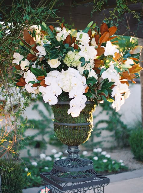 Magnolia Altar Arrangement, Magnolia Wedding Arch, Green Wedding Arrangements, Magnolia Leaves Wedding, White House Design, Magnolia Arrangement, Green And White Florals, Elegant Southern Wedding, Large Arrangement