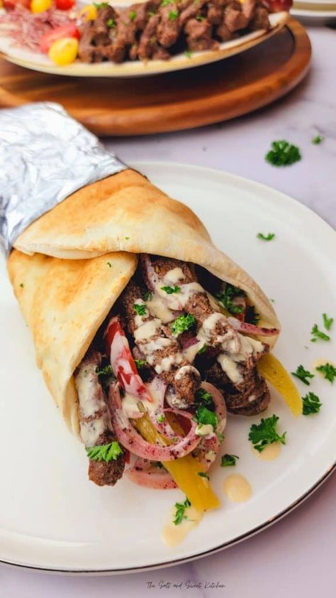 The best way to treat dad on Father’s Day is to cook an epic spread of his favorite dishes. So if you are wondering what to make for Father’s Day, then you have come to the right place. Here’s a round-up of 30+ of my favorite Father’s Day Dinner Ideas that dads all over the world will love! Lebanese Shawarma, Beef Shawarma, Lebanon Food, Shawarma Seasoning, Italian Cuisine Recipe, Shawarma Recipe, Sweet Kitchen, Beef Strips, Marinated Beef