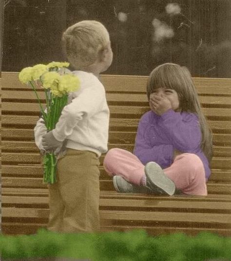 Cute picture of a little boy hiding a bunch of pretty yellow flowers on his back so he can surprise his girlfriend. Vintage Versace, Foto Vintage, The Perfect Guy, Jolie Photo, Vintage Vogue, Simple Things, Love Photos, Vintage Glamour, All You Need Is Love