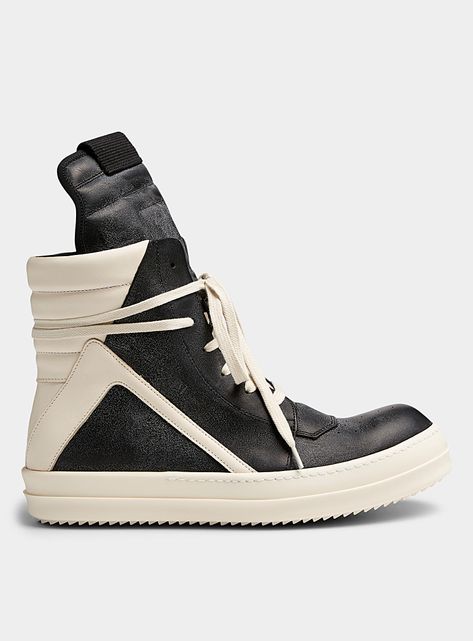 Rick Owens' uniqueness combining minimalism and excess is expressed in the features of this version of the Geobasket sneaker from the Spring/Summer 24 collection, Lido. Its signature geometric panels and quilted back counter, high-top silhouette and elongated tongue embody basketball heritage with austere purity à la Owens.- Upper in a combination of full-grain and washed leather- Vegetable tanning and natural wax finishes- Leather untreated with pigments, showing natural markings and nuances that make each product unique- Genuine leather lining- Perforated detailing at round toe- Quilted tongue and collar- Zip closure at inner side- Removable padded footbed with a leather top cover- Vulcanized rubber shark-tooth outsole- Black laces included- Made in Italy- Model number : RU01D3894LOOLCO Rick Owens Dunks, Rick Owens Geobasket, Luka Sabbat, Rick Owens Shoes, Formal Shoes For Men, Summer 24, Natural Wax, Dream Shoes, Black Laces