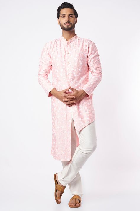 Featuring a pastel pink asymmetrical kurta in art dupion silk base with zari, thread, and floral jaal embroidery. It is paired with contrasting off white cotton silk churidar pants.   FIT: True to size.  COMPOSITION: Art dupion silk, Cotton silk.  CARE: Dry clean only. Jaal Embroidery, Silk Churidar, Rohit Bal, Tarun Tahiliani, Ethnic Design, Dupion Silk, Indian Fashion Designers, Pernia Pop Up Shop, Churidar