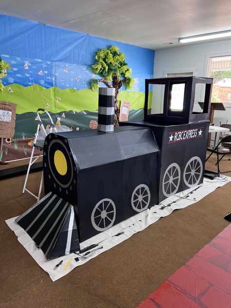 Train Made Out Of Boxes, Cardboard Train Diy How To Make, Wonder Junction Vbs 2025 Decorations, Train Vbs Decorations, Vbs Train Theme, Cardboard Train Diy, Wonder Junction Vbs, Wonder Junction Vbs 2025, Train Depot Decor