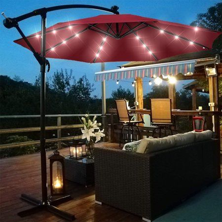 SEGMART Upgraded Patio Umbrella has sun-proof function and sturdy construction with 32 solar LED lights. Even on the sunniest day, you can enjoy your outdoor living spaces and remain cooler by using this Patio Sun Shading Umbrella. It is probably the best way to stay outside without absorbing the harmful UV rays of the sun, which causes serious sunburns or even skin cancers. At the same time, it is a perfect choice when there is time that rain to spot and you still want to enjoy the outdoor scen Patio Upgrade, Cantilever Patio Umbrella, Offset Patio Umbrella, Lights Hanging, Offset Umbrella, Solar Led Lights, Umbrella Designs, Outdoor Stuff, Cantilever Umbrella